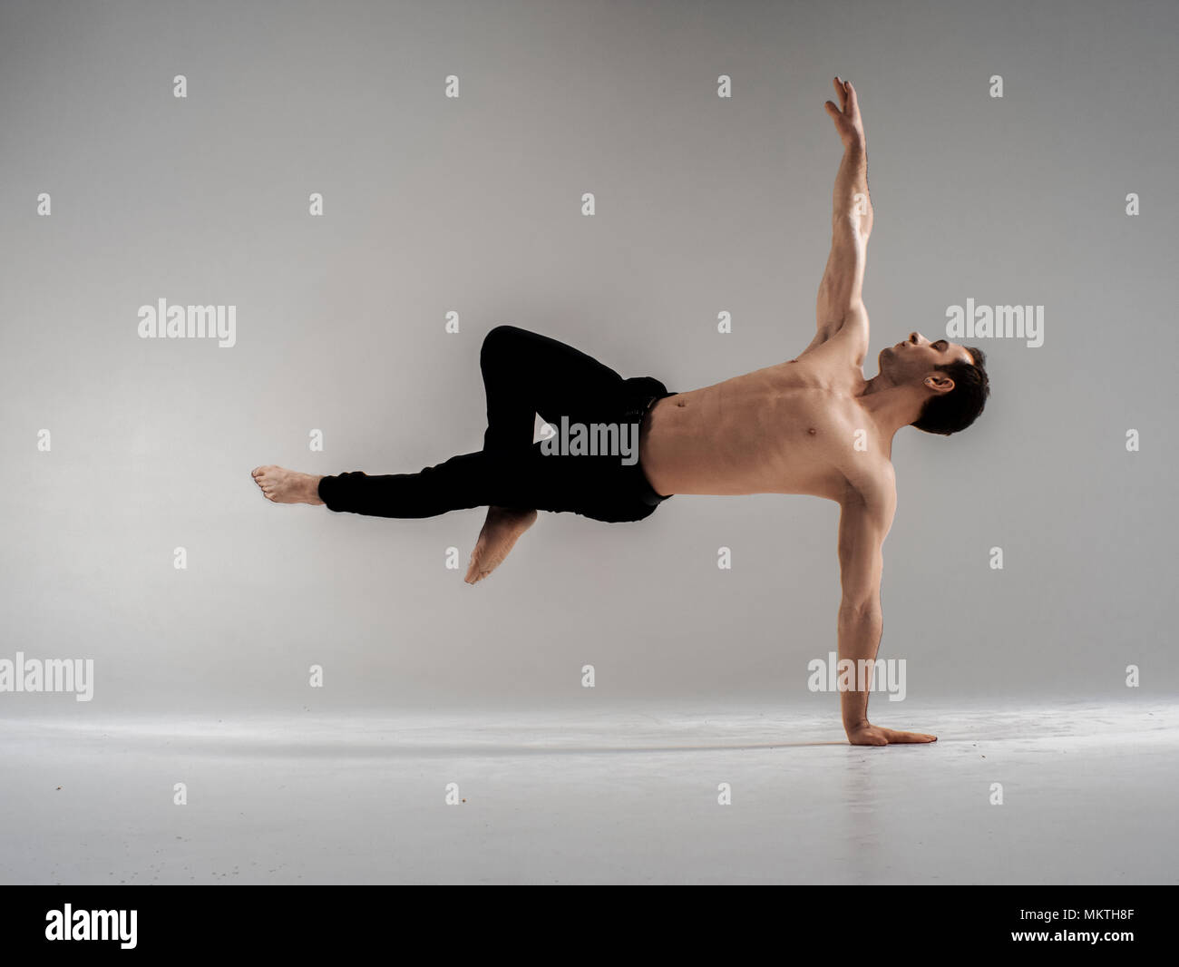 Modern ballet dancer performing art jump with empty copy space background, izolated space Stock Photo