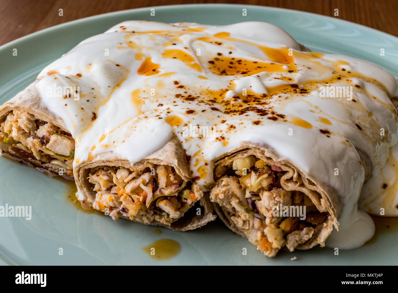 Chicken shawarma kebab with yogurt and fried butter sauce / Tantuni