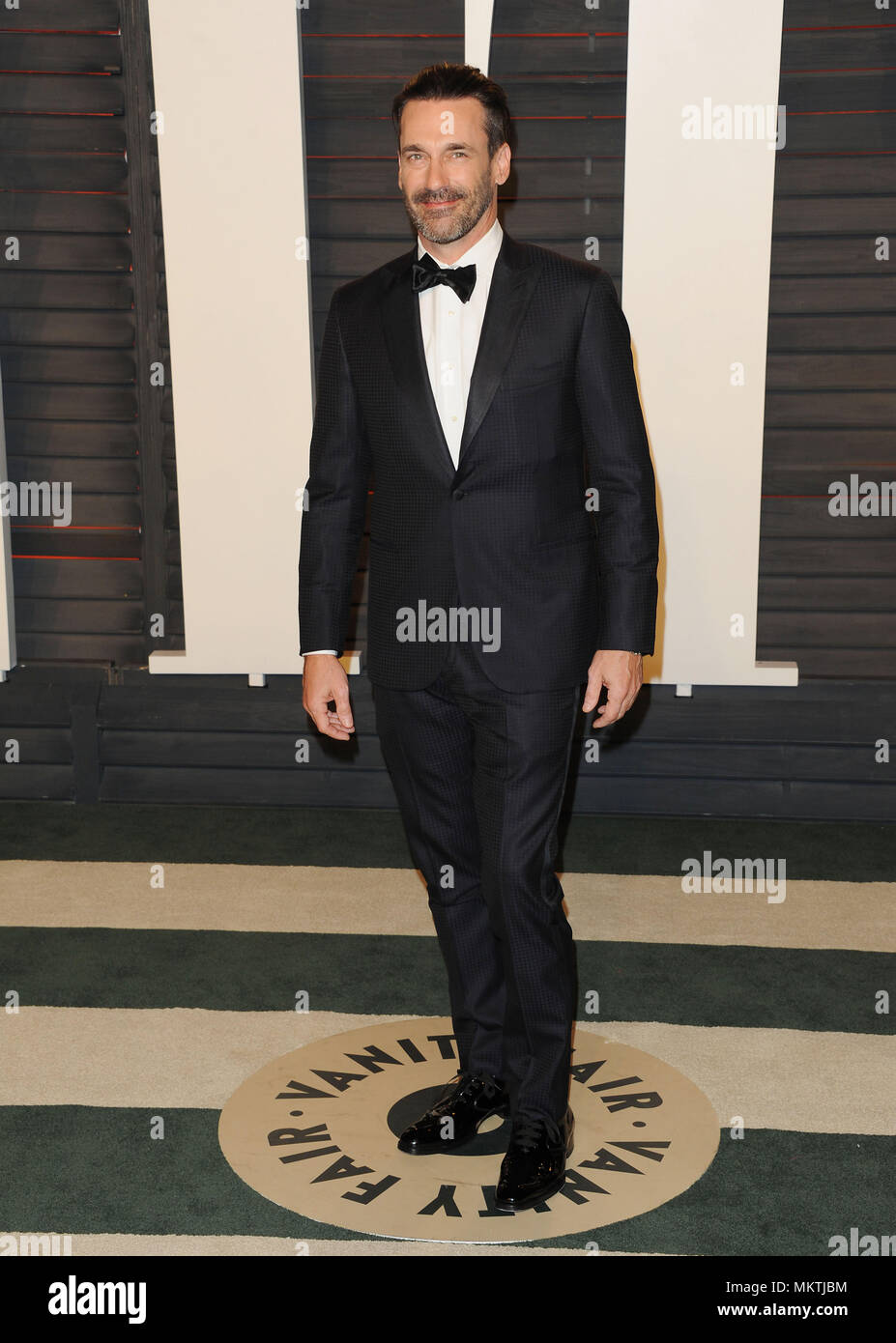 Jon Hamm 299 arriving at the Vanity Fair's Oscar Party 2016 at the Playhouse in Los Angeles. February 28, 2016. -------- Jon Hamm 299  --------- Event in Hollywood Life - California,  Red Carpet Event, Vertical, USA, Film Industry, Celebrities,  Photography, Bestof, Arts Culture and Entertainment, Topix Celebrities fashion /  from the Red Carpet-2016, one person, Vertical, Best of, Hollywood Life, Event in Hollywood Life - California,  Red Carpet and backstage, USA, Film Industry, Celebrities,  movie celebrities, TV celebrities, Music celebrities, Photography, Bestof, Arts Culture and Entertai Stock Photo