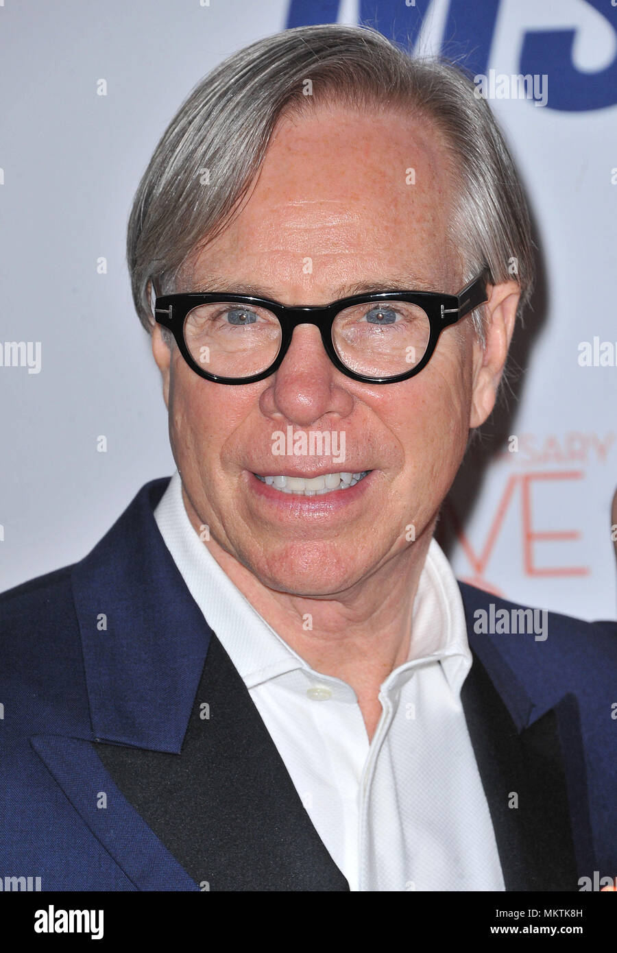 Tommy Hilfiger arriving at The 20th Ann. Race To Erase MS 2013 at the Hyatt  Hotel in Los Angeles.Tommy Hilfiger Red Carpet Event, Vertical, USA, Film  Industry, Celebrities, Photography, Bestof, Arts Culture
