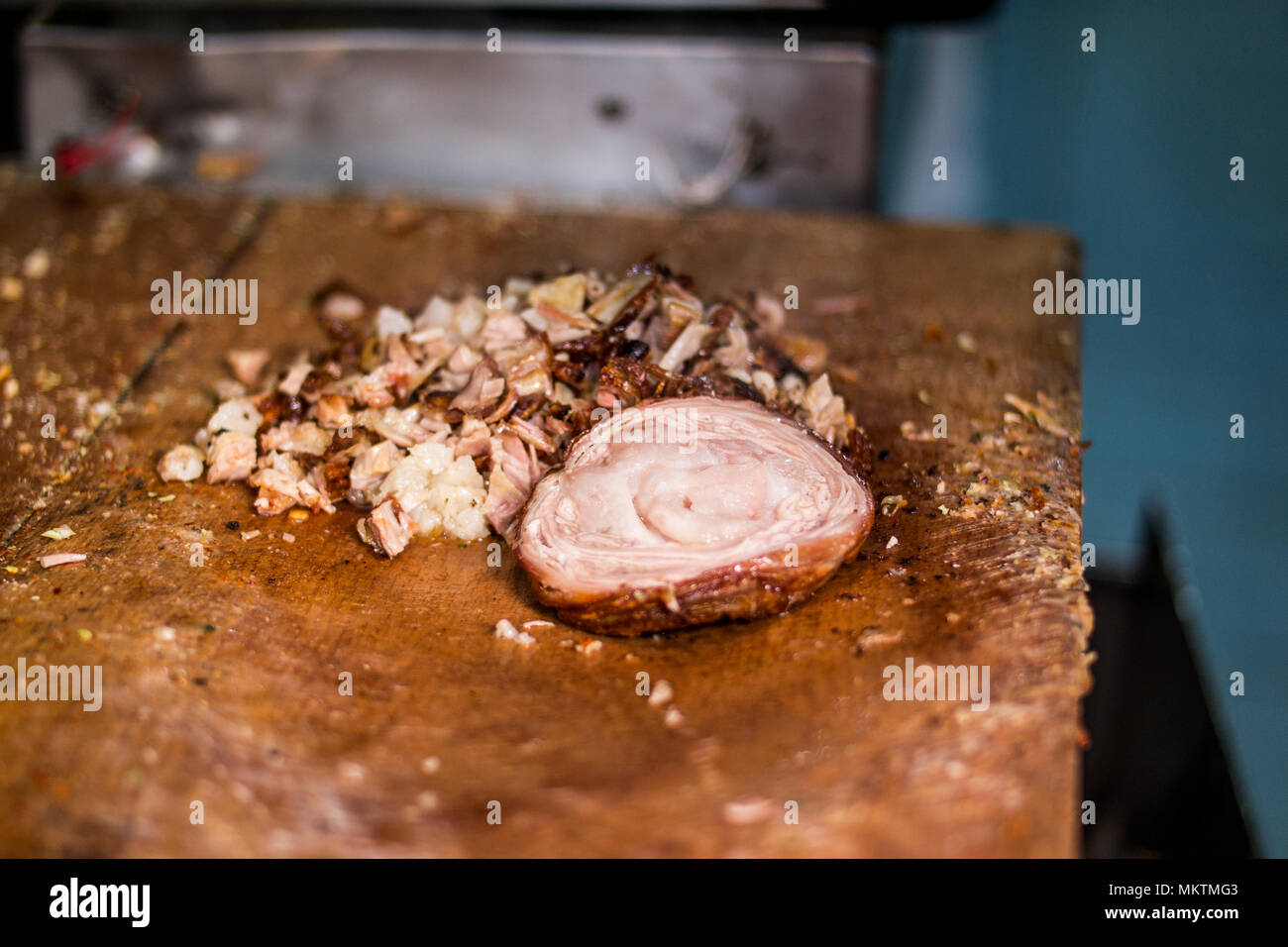 Turkish Street Food Kokorec made with sheep bowel with tomatoes and spices. fast food Stock Photo