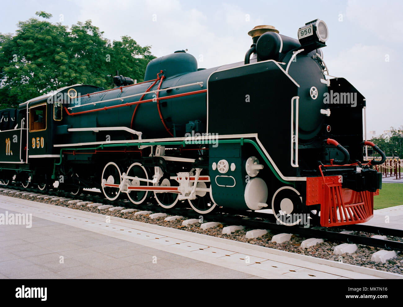 Transport - Steam train locomotive at Thonburi Station in Bangkok in Thailand in Southeast Asia Far East. Trains History Travel Stock Photo