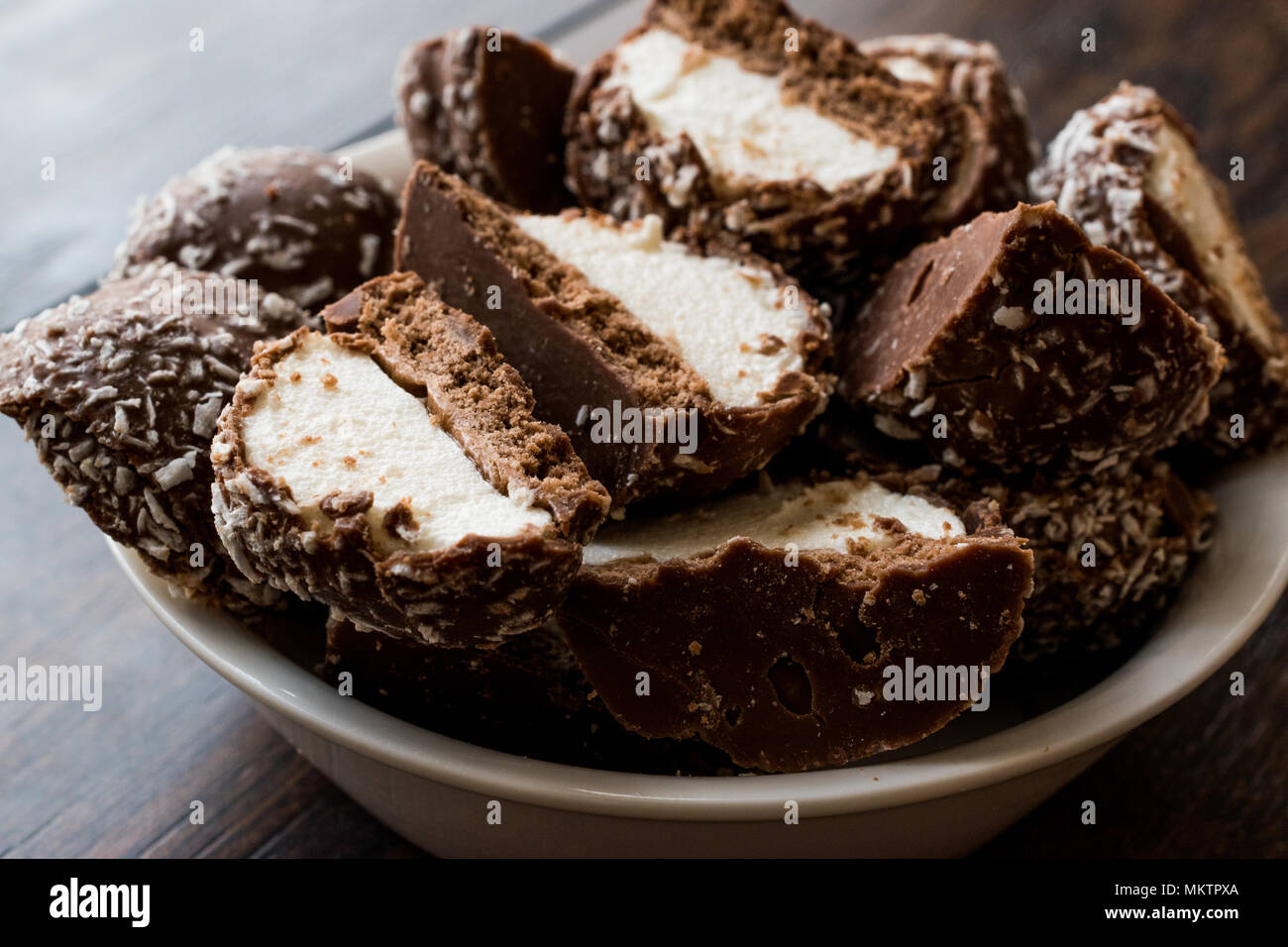 Chocolate Covered Marshmallows with Coconut Powder. Dessert concept