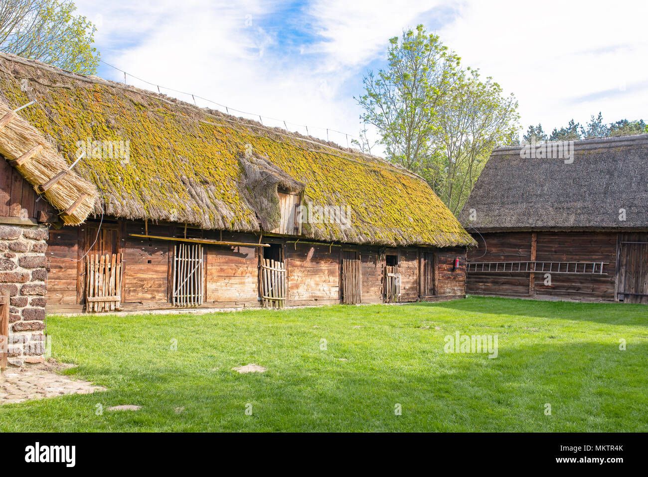 Traditional old polish countryside wooden thatched houses and farmyards