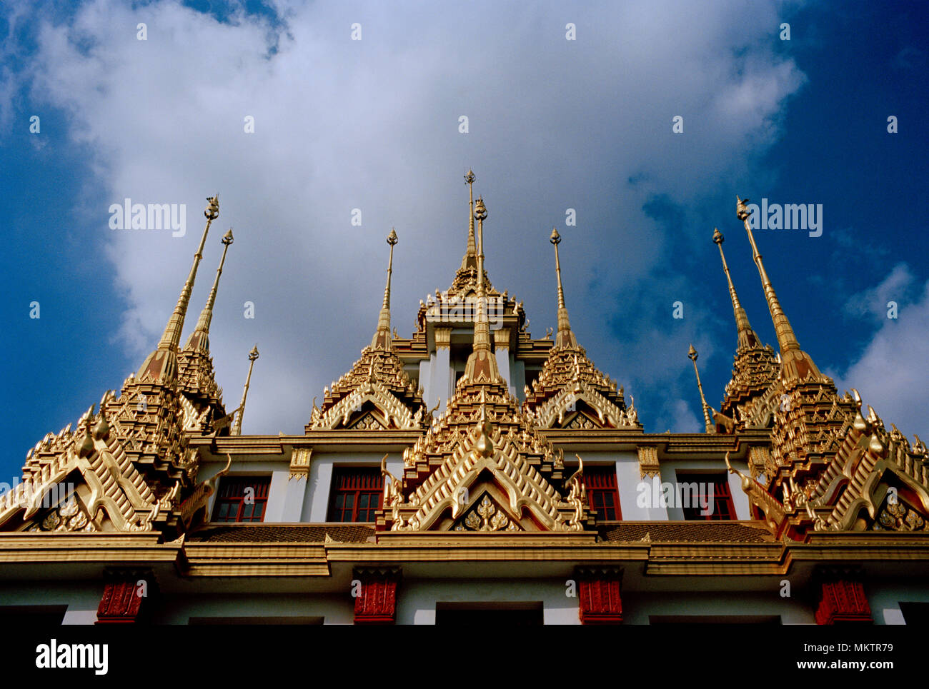 Spires of the Buddhist temple Loha Prasat Metal Castle of Wat Ratchanadda in Bangkok in Thailand in Southeast Asia Far East. Travel Holiday Site Stock Photo