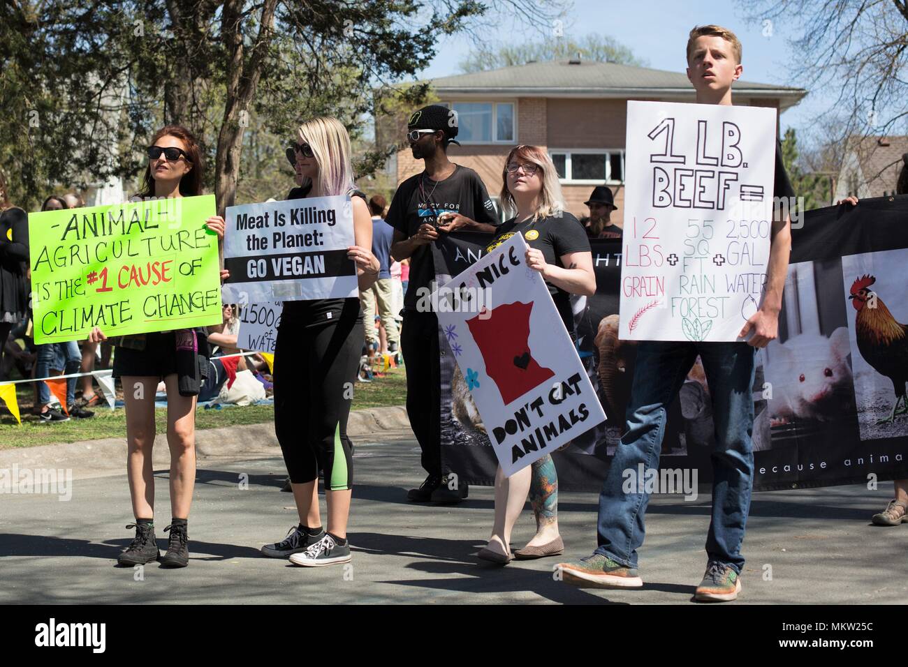 Animal rights protesters at the May Day parade and festival in Minneapolis, Minnesota, USA Stock