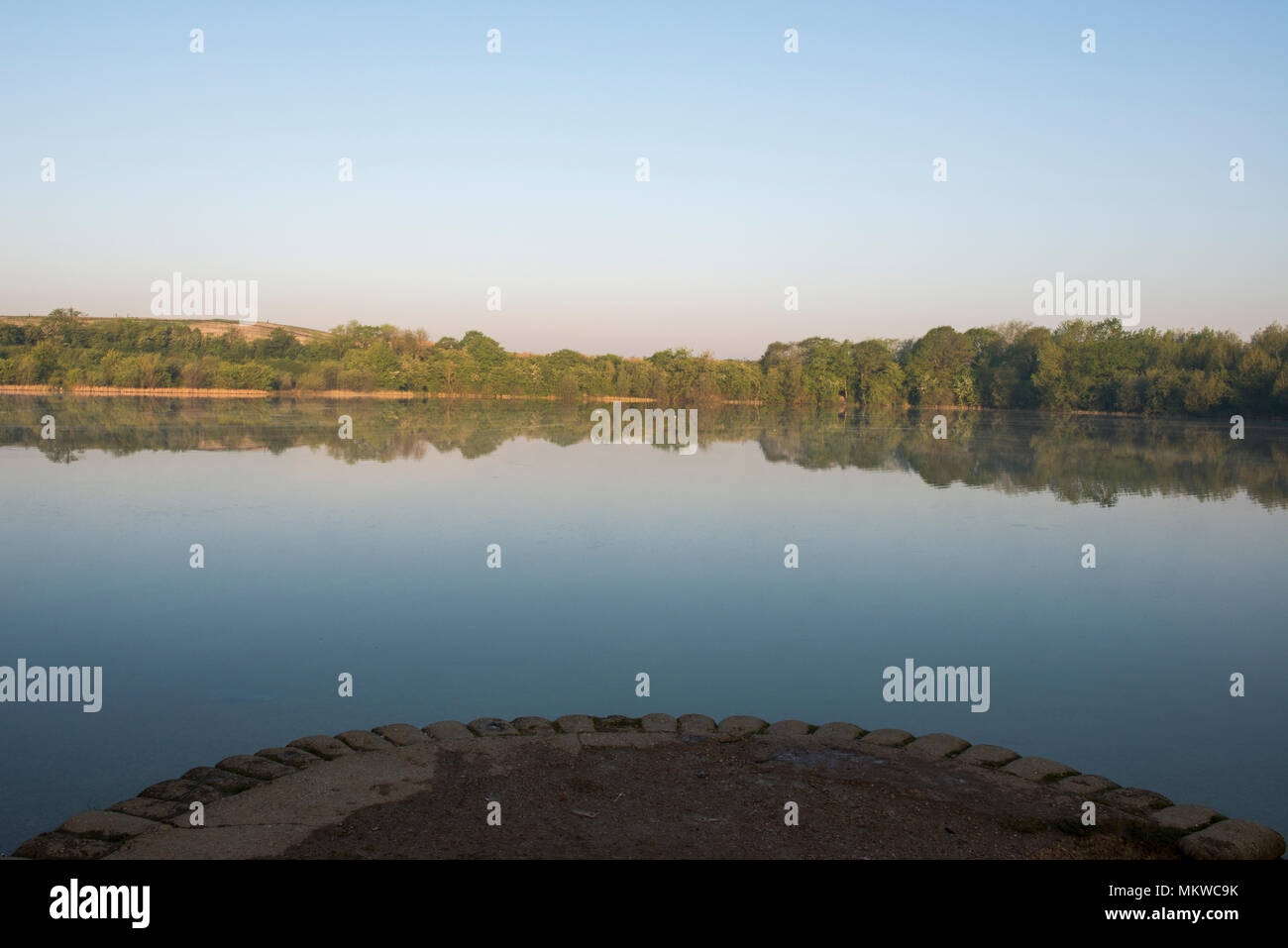 pic Blue Lagoon Lake Milton Keynes https www alamy com early morning mist rising from blue lagoon nature reserve bletchley milton keynes buckinghamshire on 8th may 2018 image184340623 html