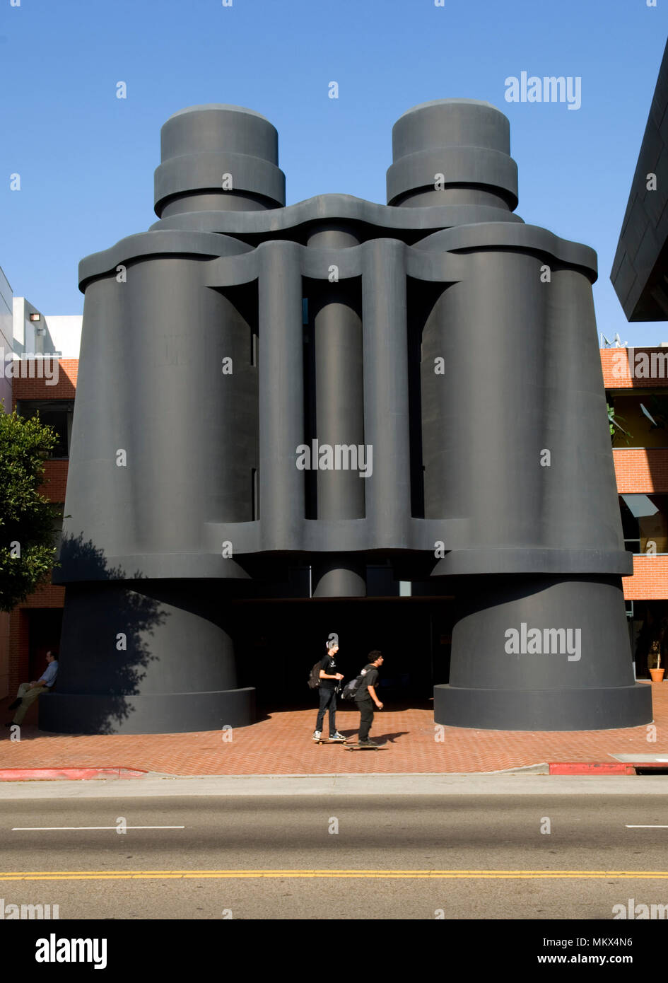 Giant binoculars in front of building designed by architect Frank Gehry in Venice Beach, California Stock Photo