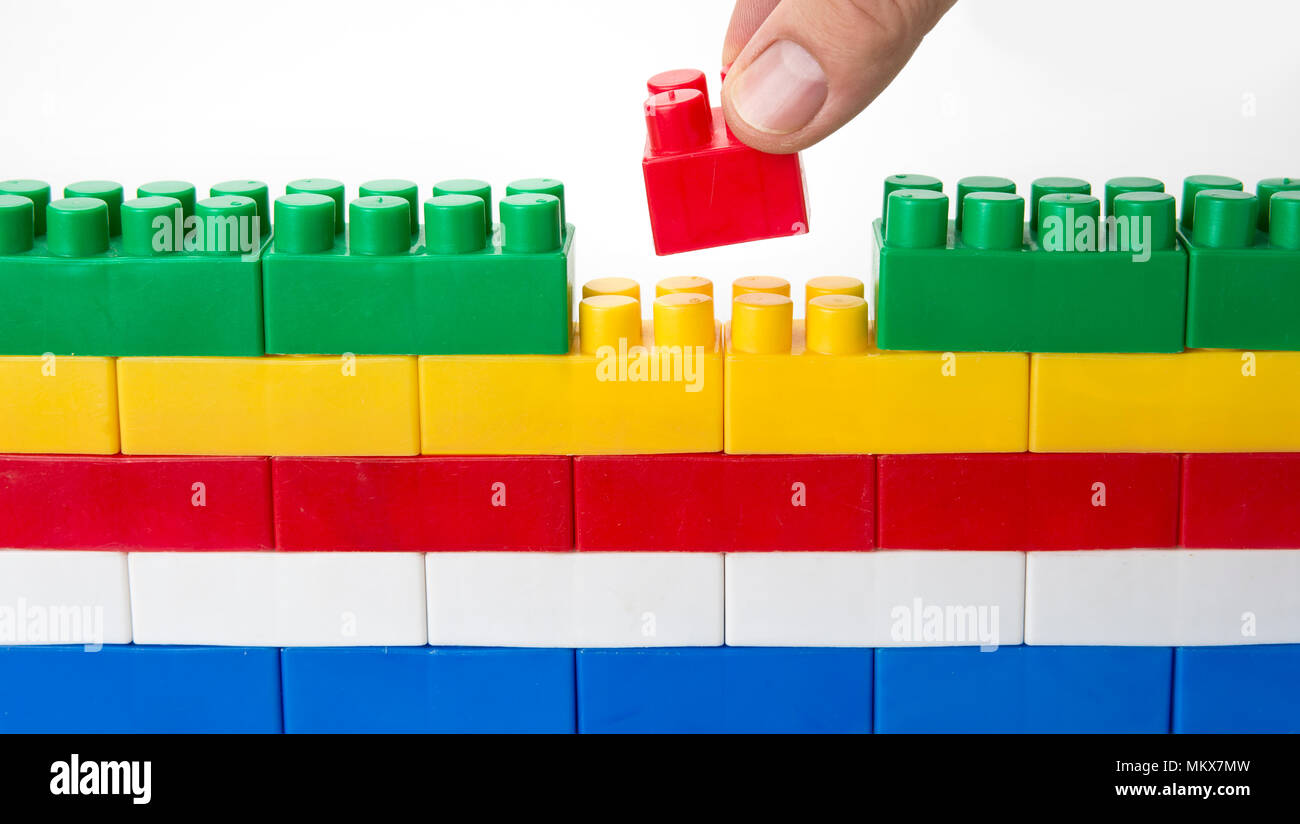 Lego wall. Creativity unity and fit or doesn't fit concept Stock Photo -  Alamy