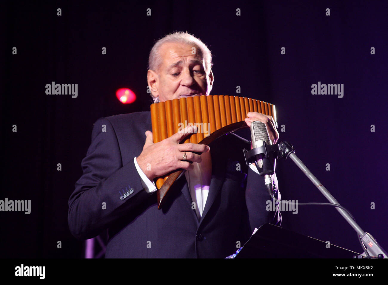 Pan flute player hi-res stock photography and images - Alamy