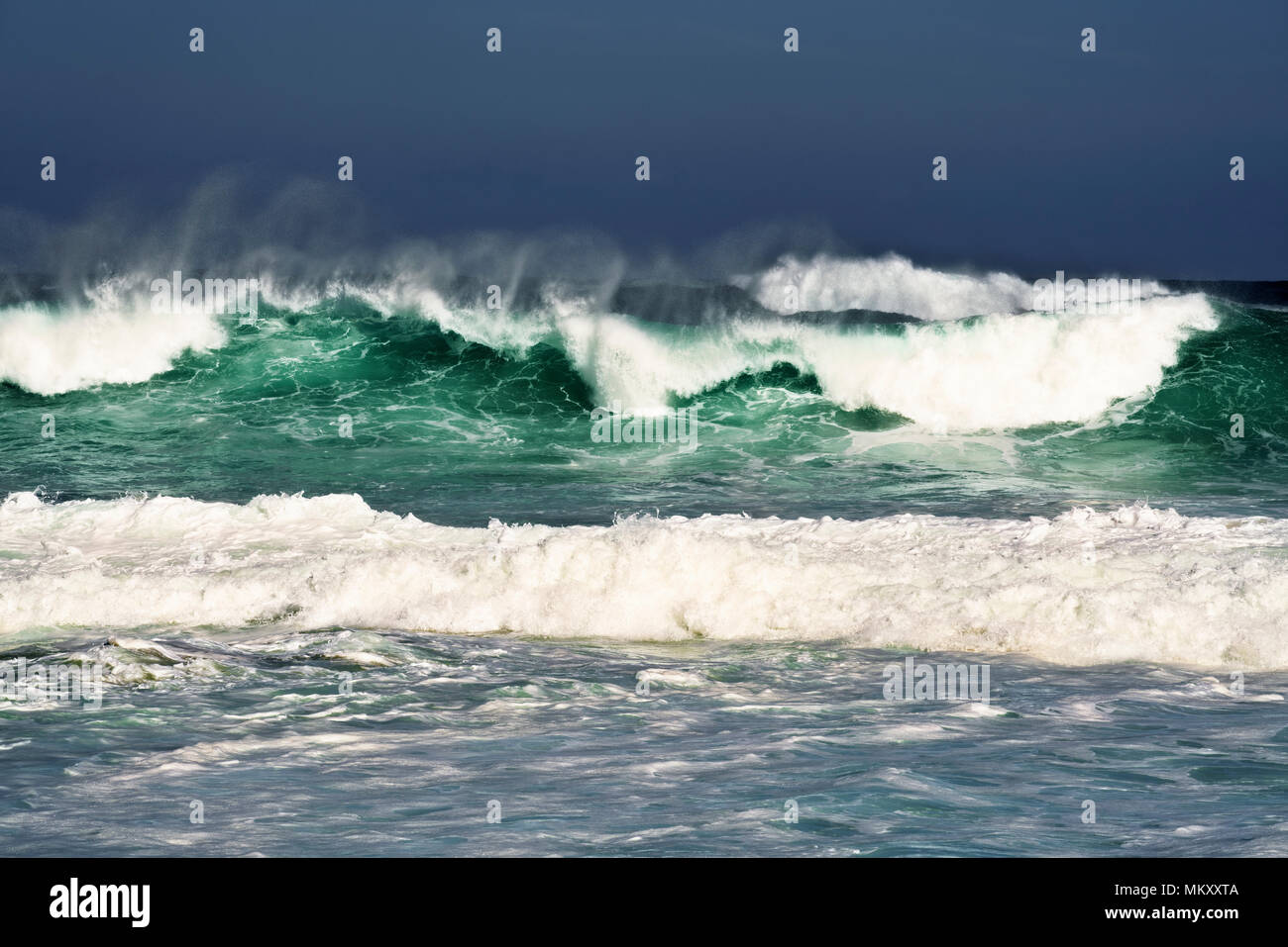 Giant waves build near Haena Beach along the North Shore on Hawaii's