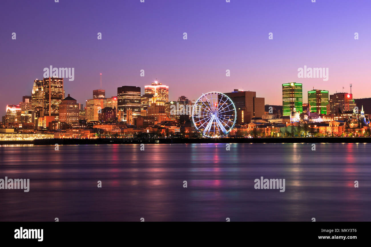 Montreal skyline at dusk and Saint Lawrence River in Quebec, Canada Stock Photo