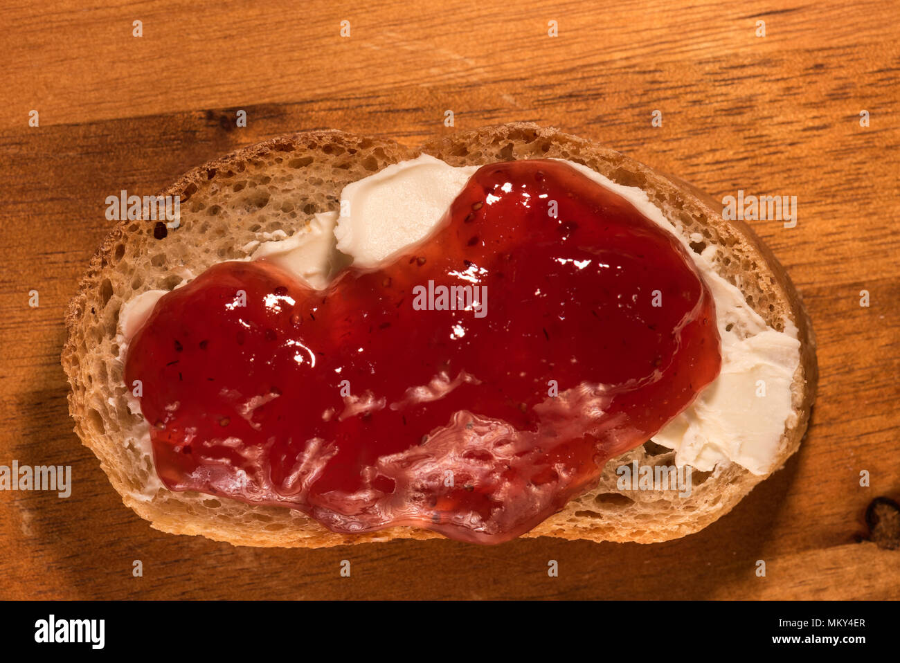 Whole wheat toast with strawberrry jam and cream cheese Stock Photo Alamy