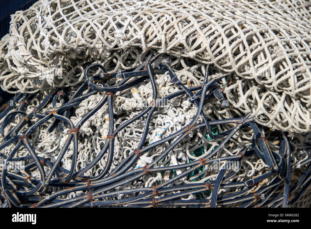 Porec Harbor, Istria, Croatia - Piles of colorful fishing net and rope Stock Photo