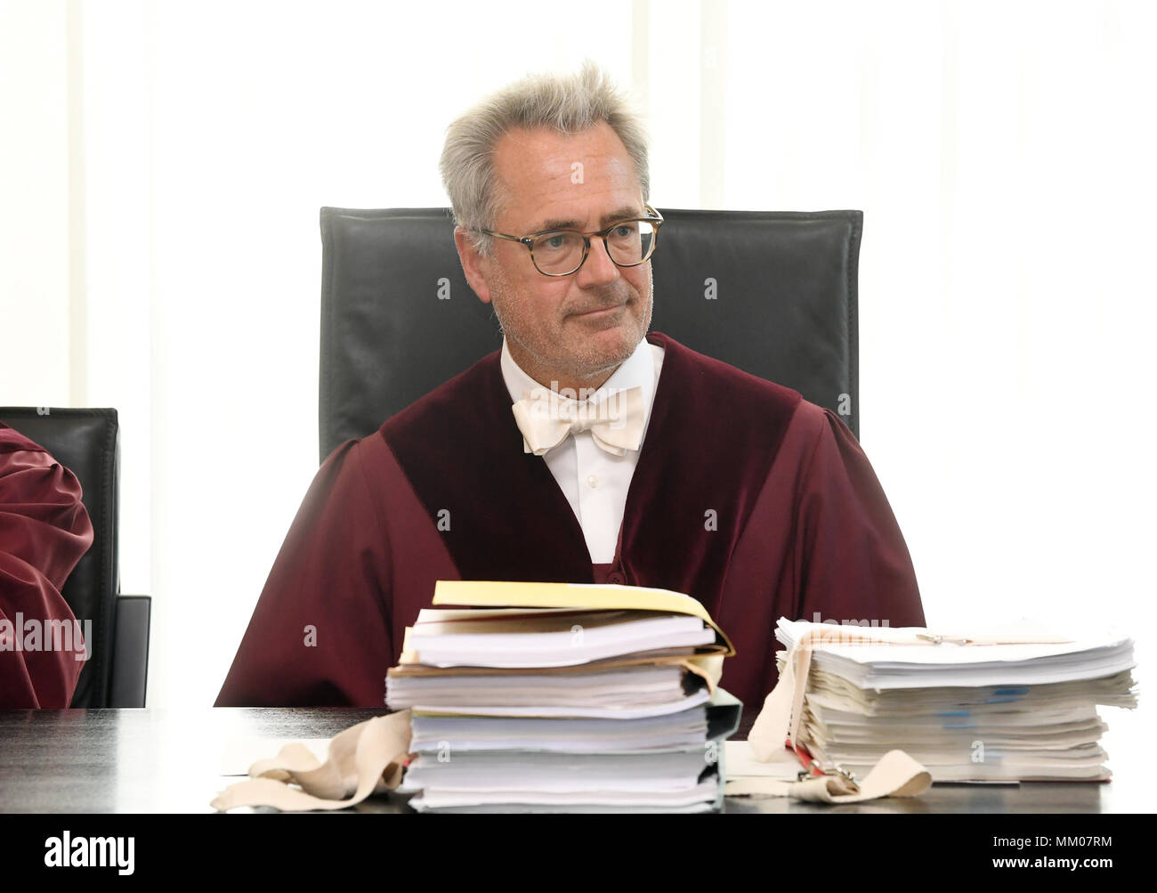 09 May 2018, Germany, Karlsruhe: The chair of the First Civil Chamber at the Federal Supreme Court (BGH), Thomas Koch, opens the trial. The Federal Supreme Court is negotiating whether the music platform Youtube bears liability for copyright infringements of their users. A music producer has been suing the Google subsidiary for ten years. Photo: Uli Deck/dpa Stock Photo