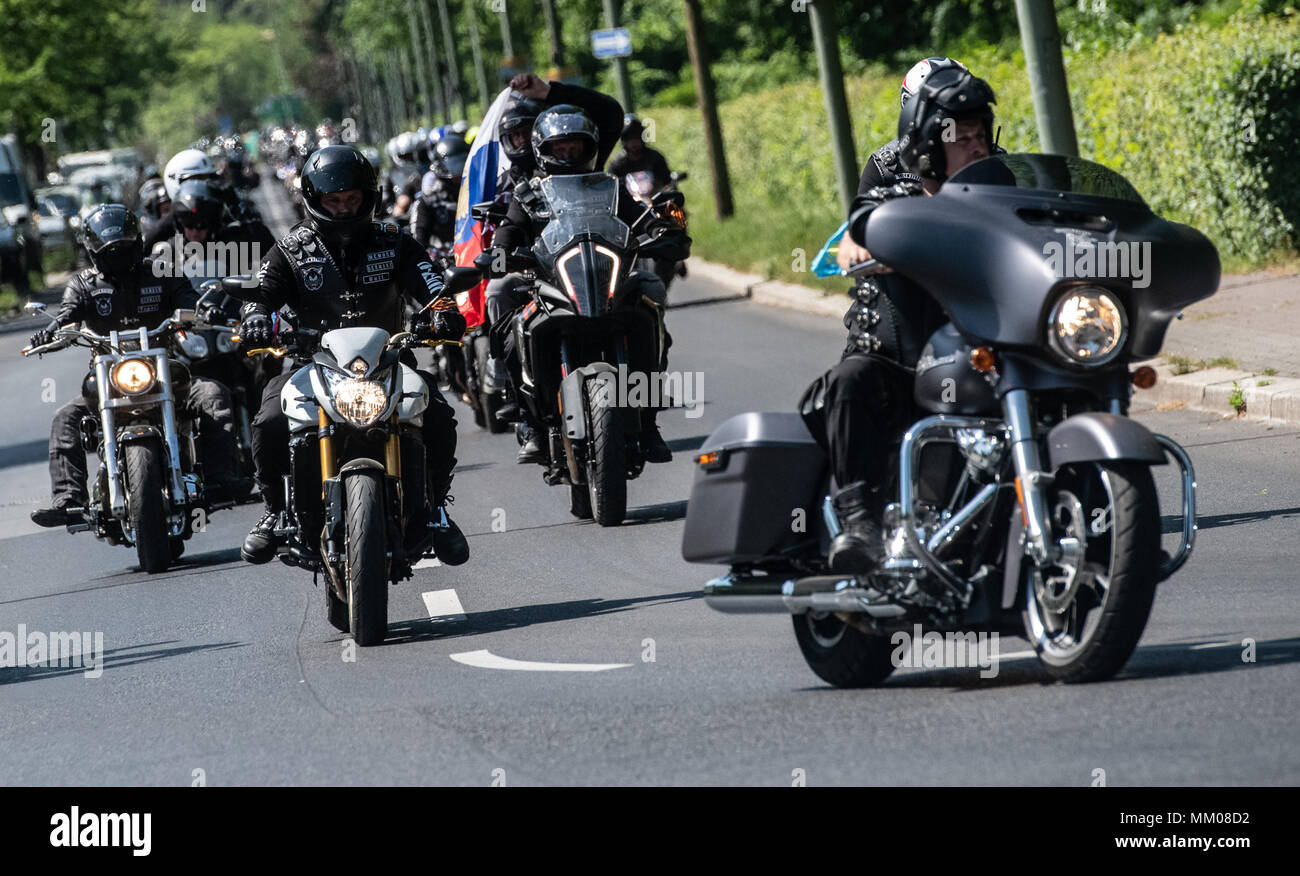 09 May 2018, Germany, Berlin: Members of the Russian motorcycle gang 'Night Wolves' driving through Berlin on 'Victory Day'. Russia and the other former Soviet republics pay tribute to the victory over Hitler's Germany of 1945 on 09 May. Photo: Paul Zinken/dpa Stock Photo