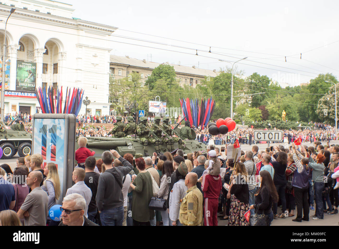 DONETSK, Donetsk People Republic. May 9, 2018: Soviet anti-air gun track with gunners on the main street of the Donetsk city during the Victory Day Parade.DONETSK, Donetsk People Republic. May 9, 2018: Soviet armored infantry support machine on the main street of the Donetsk city during the Victory Day Parade. Credit: An147/Alamy Live News Stock Photo