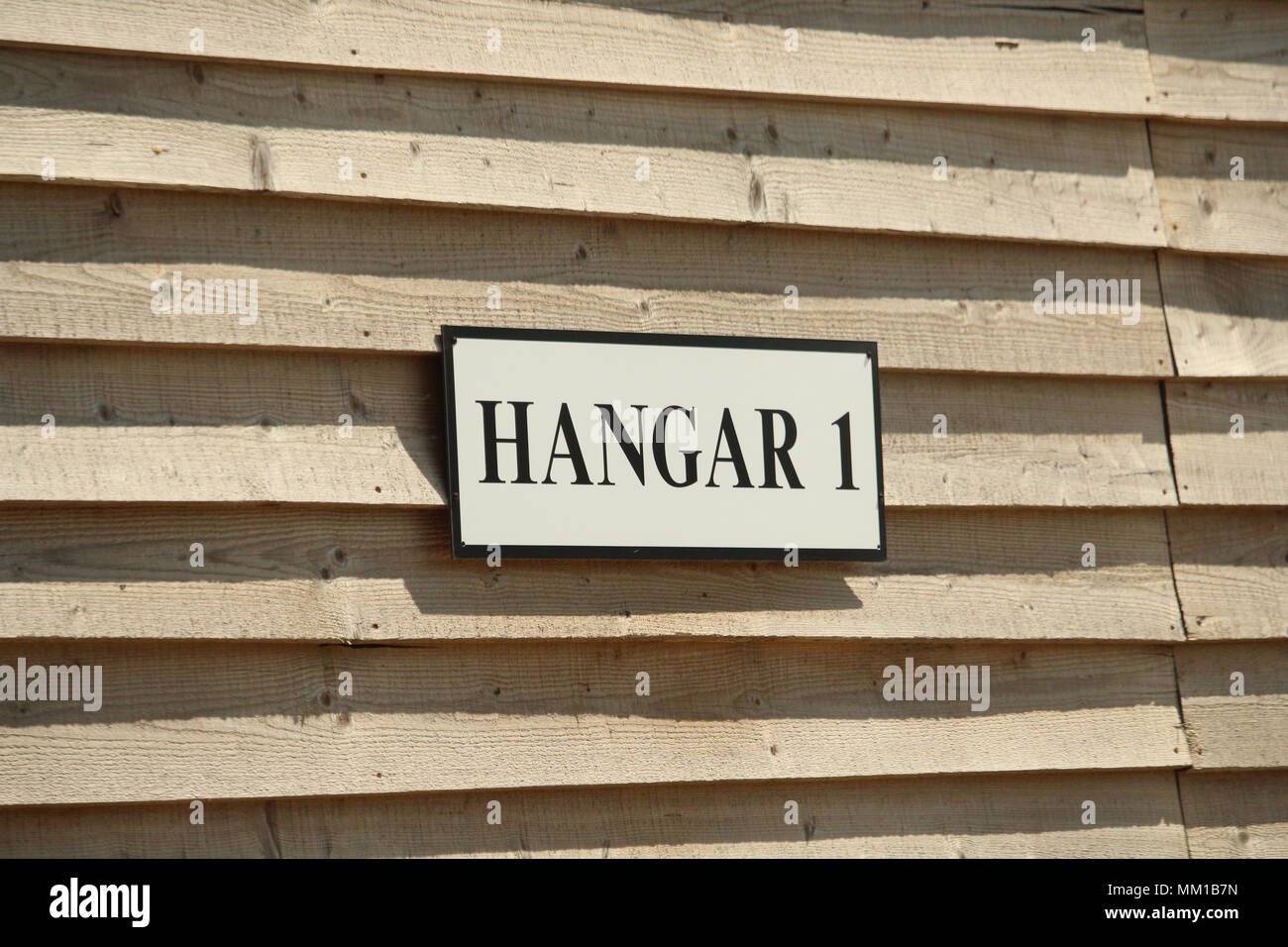 Close up of Hangar 1 Plate on frontage of building at Stow Maries Great War Aerodrome, Purleigh, Maldon, Essex, Britain. Stock Photo