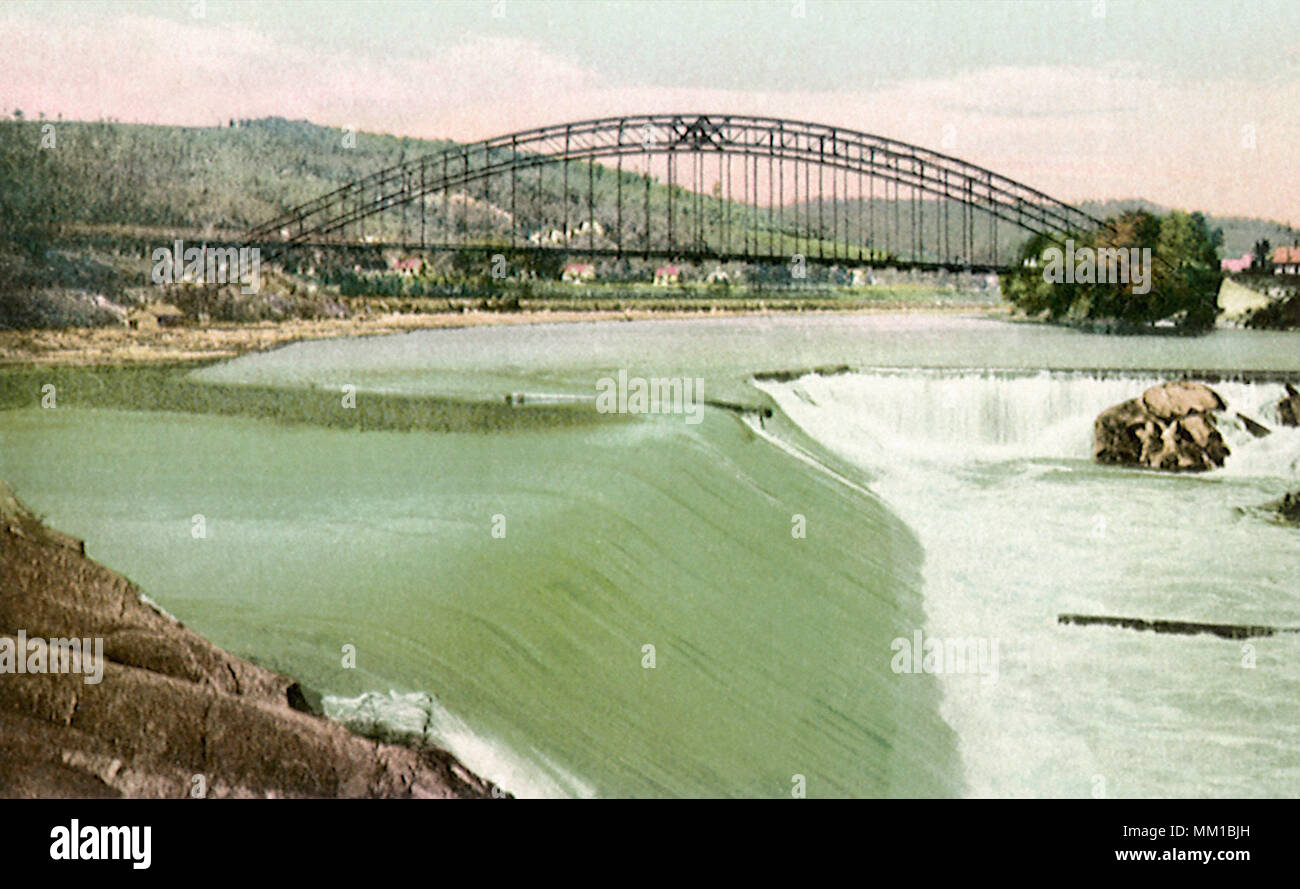Falls and Arch Bridge. Bellows Falls. 1920 Stock Photo