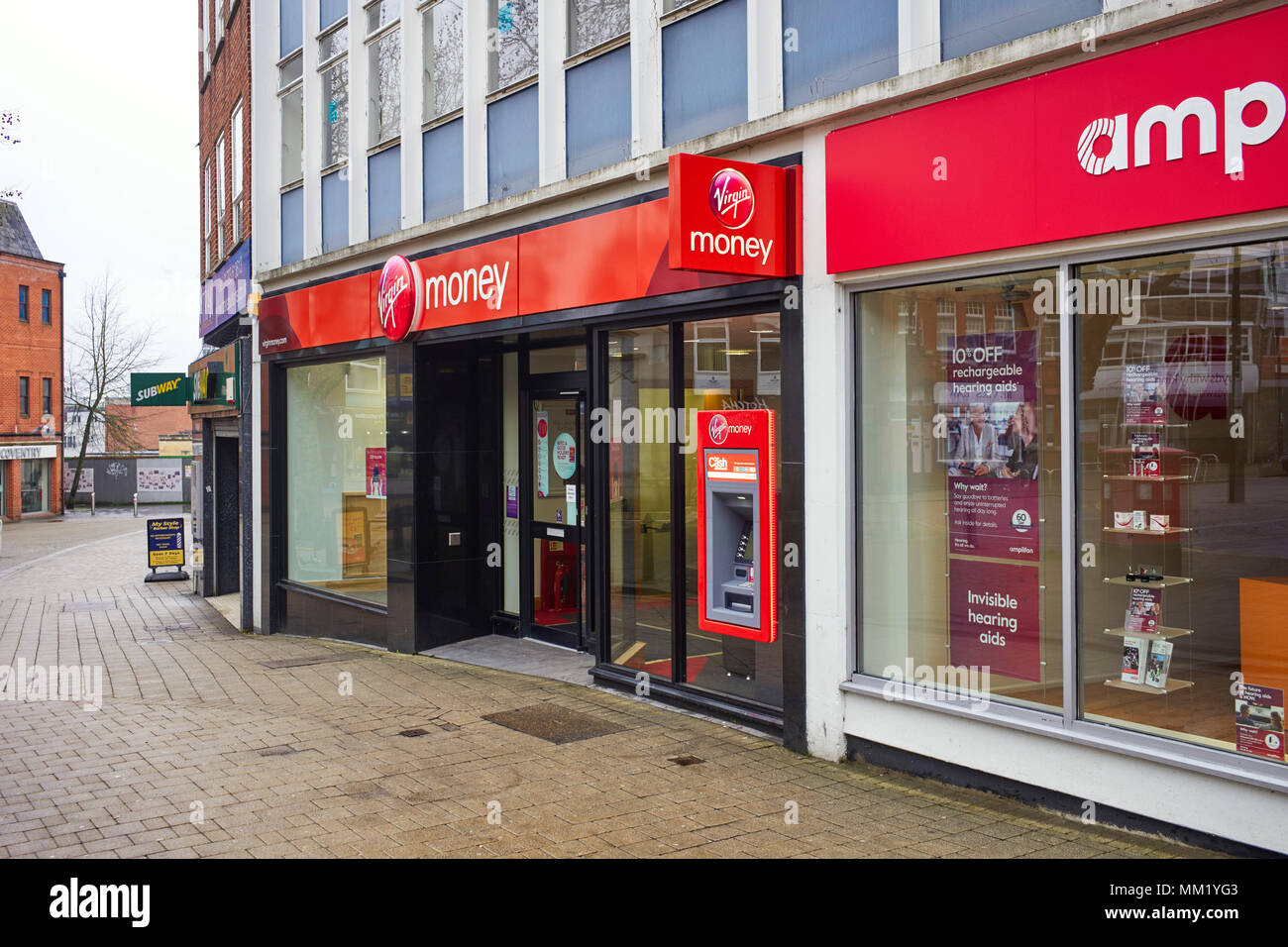Virgin money shop or bank with cash machine outside in the centre of Swindon Stock Photo