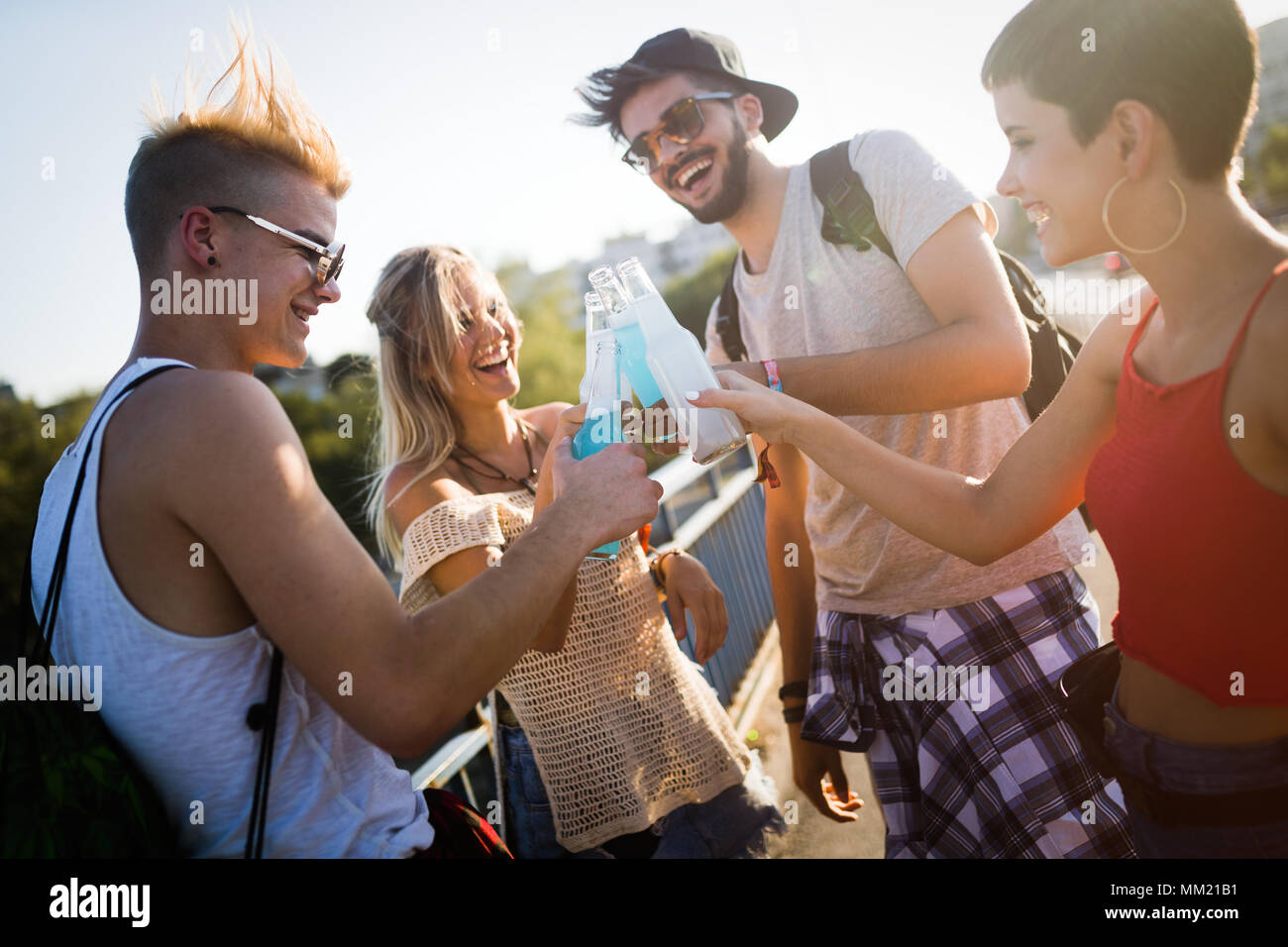 Group of young friends having fun together Stock Photo - Alamy