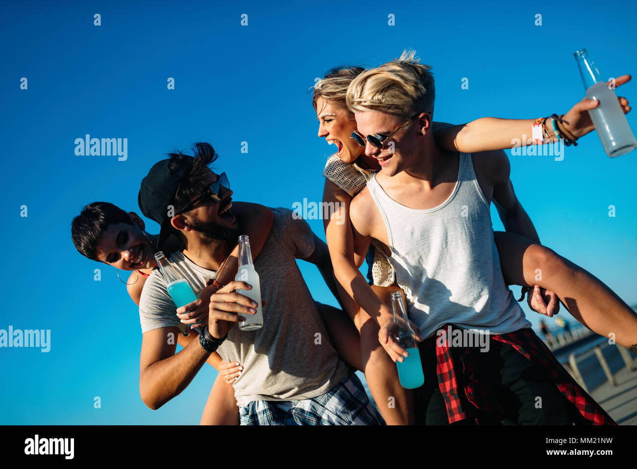 Group of young friends having fun together Stock Photo - Alamy