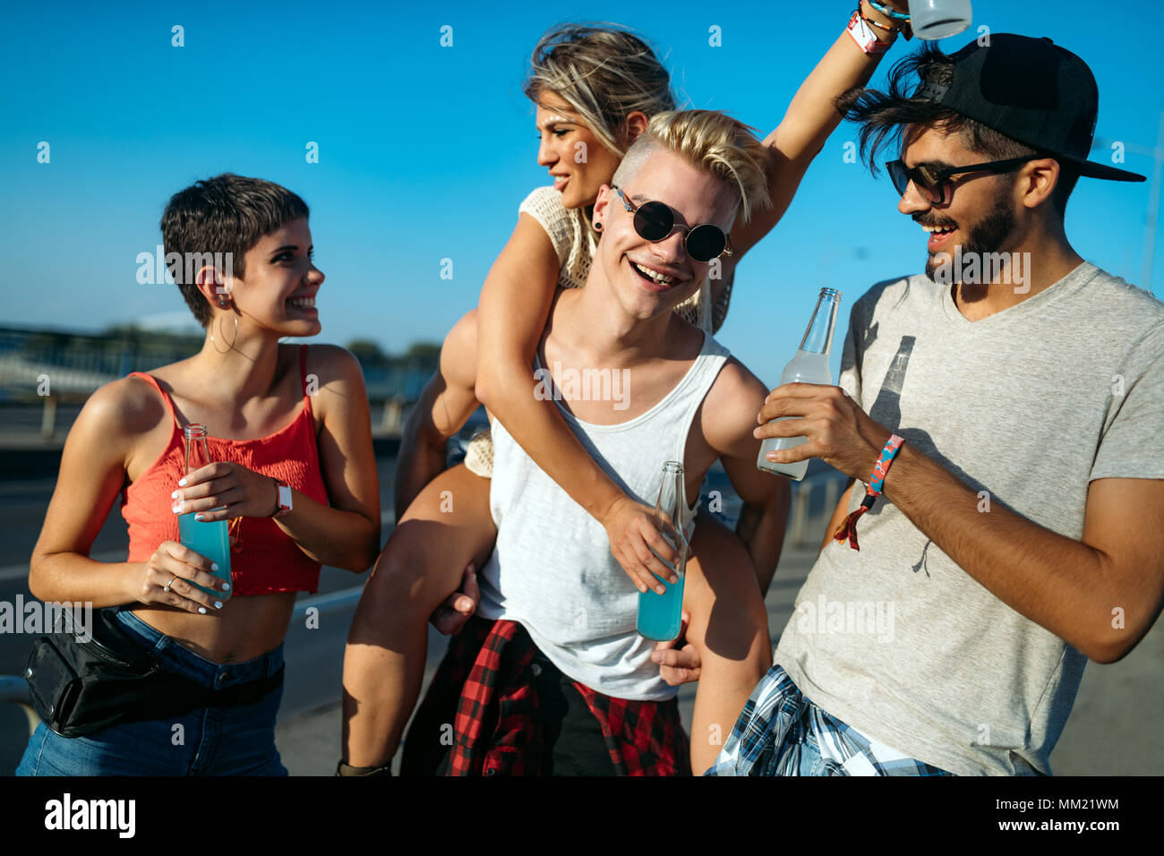 Group of young friends having fun together Stock Photo - Alamy