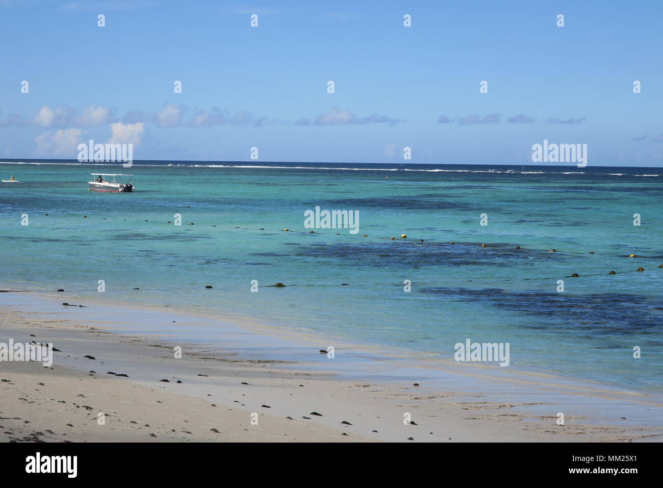 Colorful Indian ocean on a west side of Mauritius island Stock Photo ...