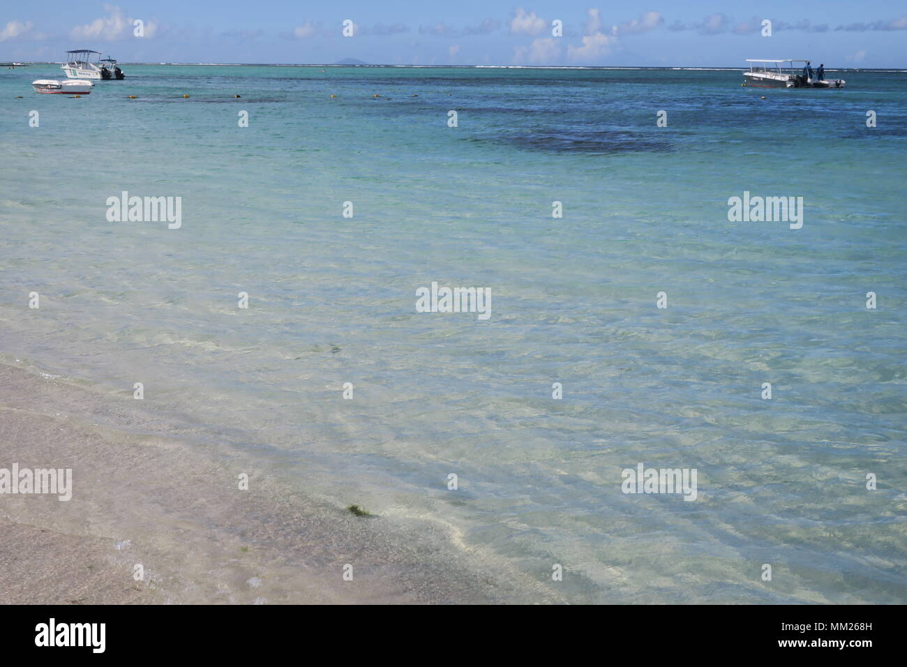 Colorful Indian ocean on a west side of Mauritius island Stock Photo ...