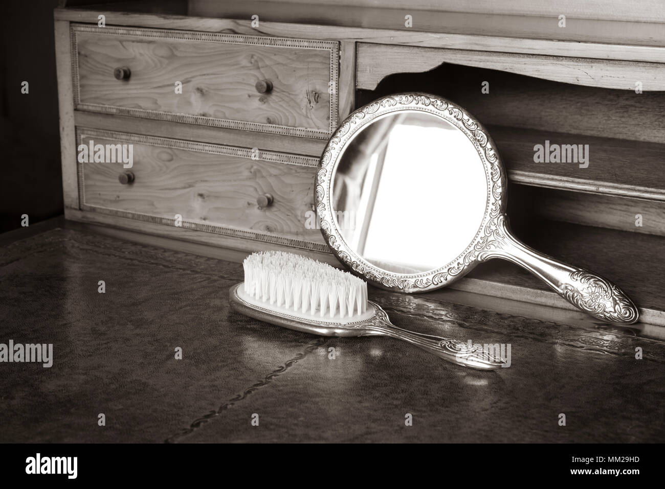 Antique Wooden Desk With Siver Mirror And Hair Brush In Sepia