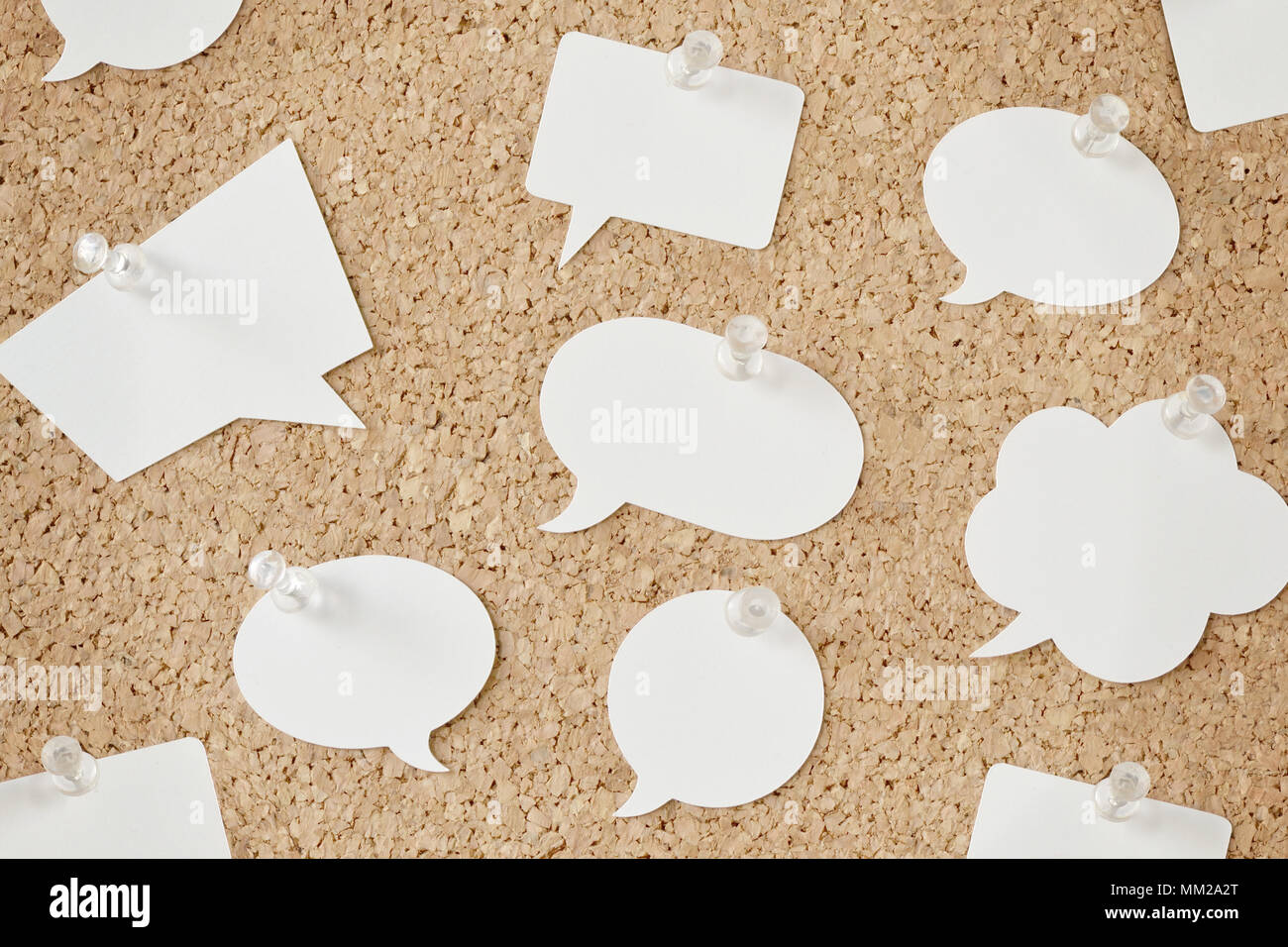 Speech bubbles on pinboard Stock Photo