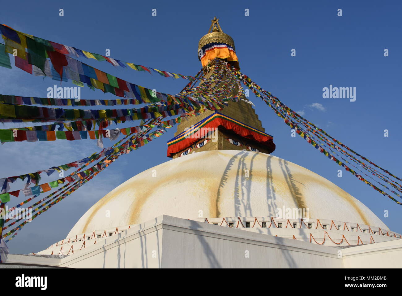 Boudhanath Stupa in the evening sun, Kathmandu, Nepal Stock Photo