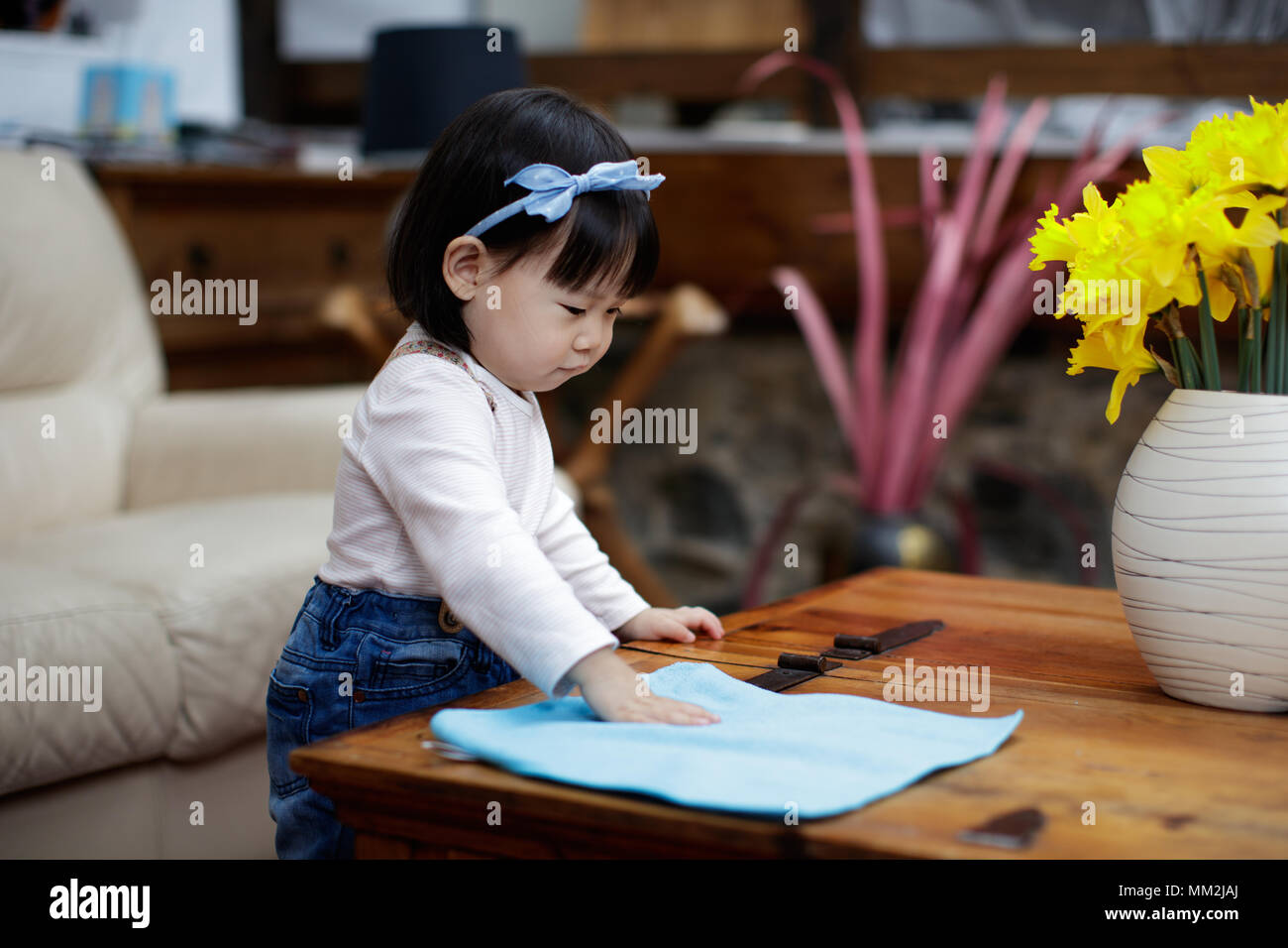 baby girl pretend play at home Stock Photo - Alamy