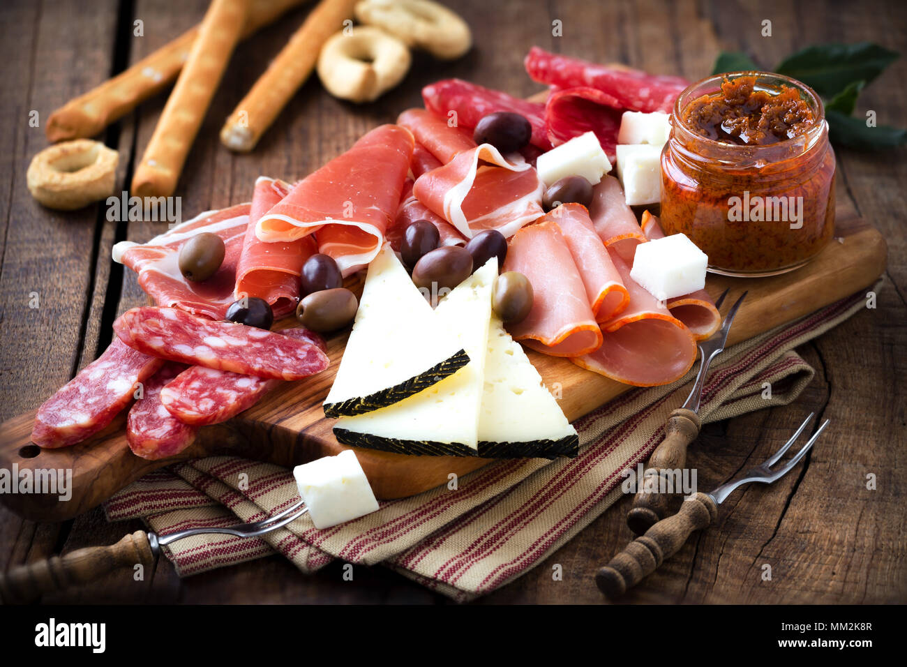 Cured meat and cheese platter of traditional Spanish tapas chorizo