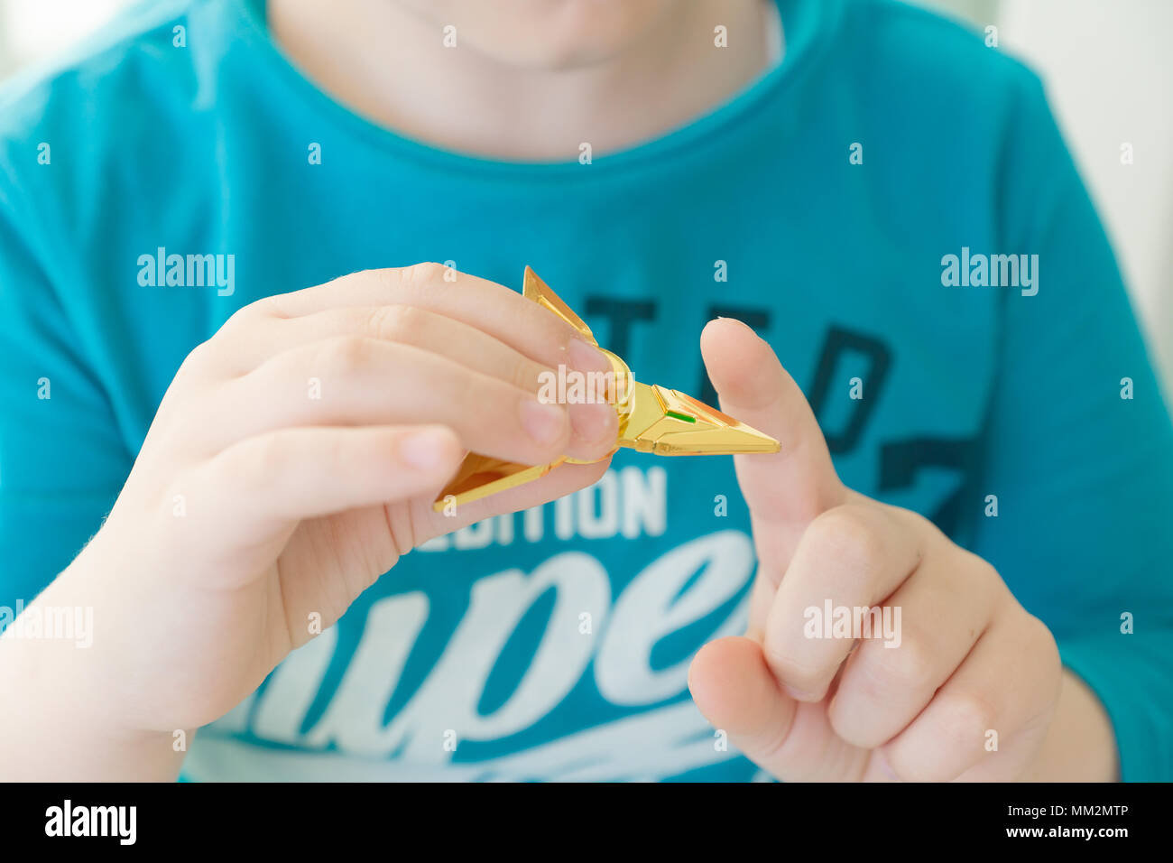 Close-up of a child fingers spinning a spinner Stock Photo