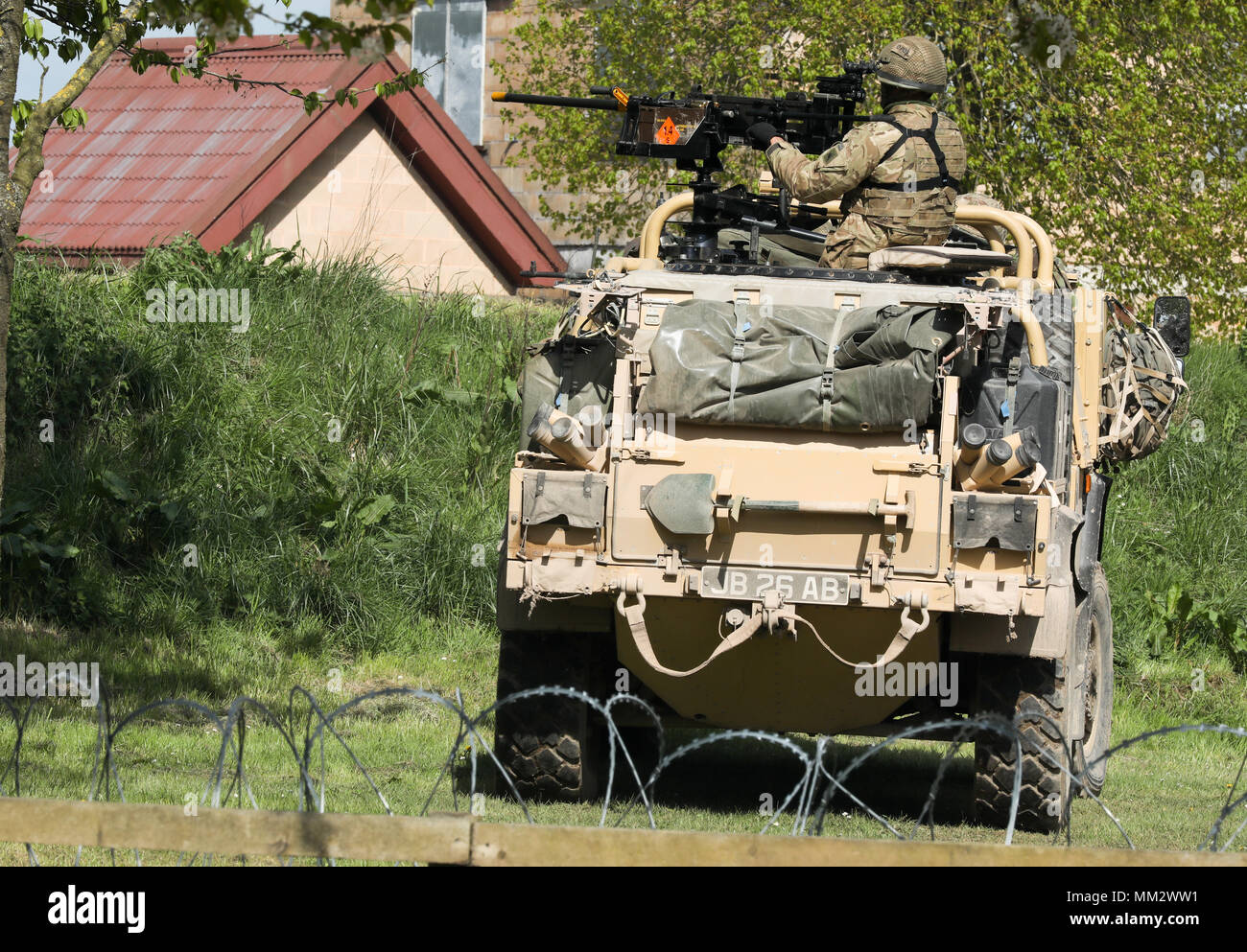 Members of 3 Para operating the Jackal armoured reconnaissance vehicle training at Copehill Down on Salisbury plain Stock Photo