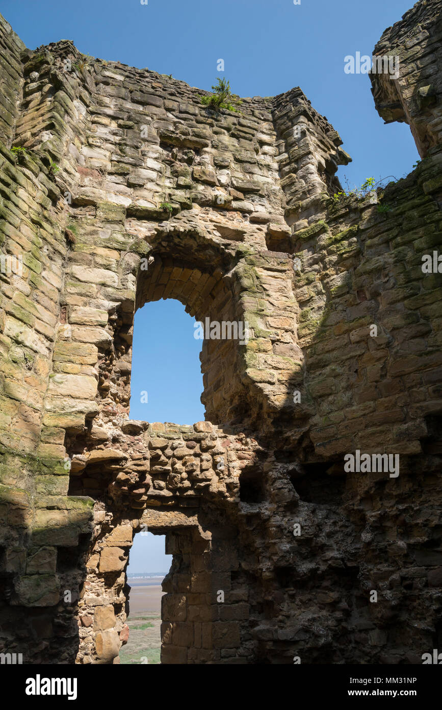 Ruins of Flint Castle beside the river Dee in Flintshire, North Wales. Window in the North East tower. Stock Photo