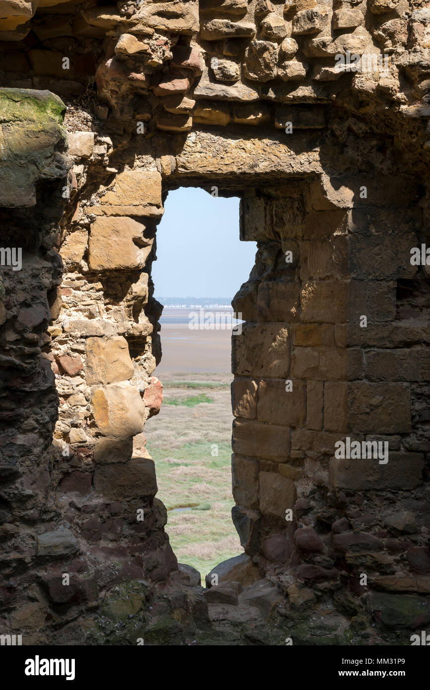 Ruins of Flint Castle beside the river Dee in Flintshire, North Wales. Window in the North East tower. Stock Photo