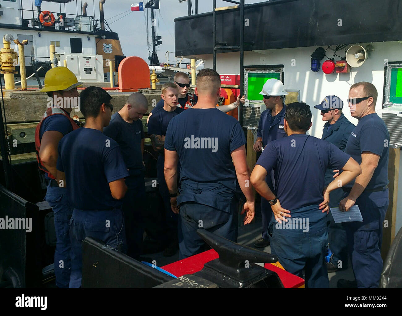 Coast Guard Chief Petty Officer Henry Meyer conducts an operations