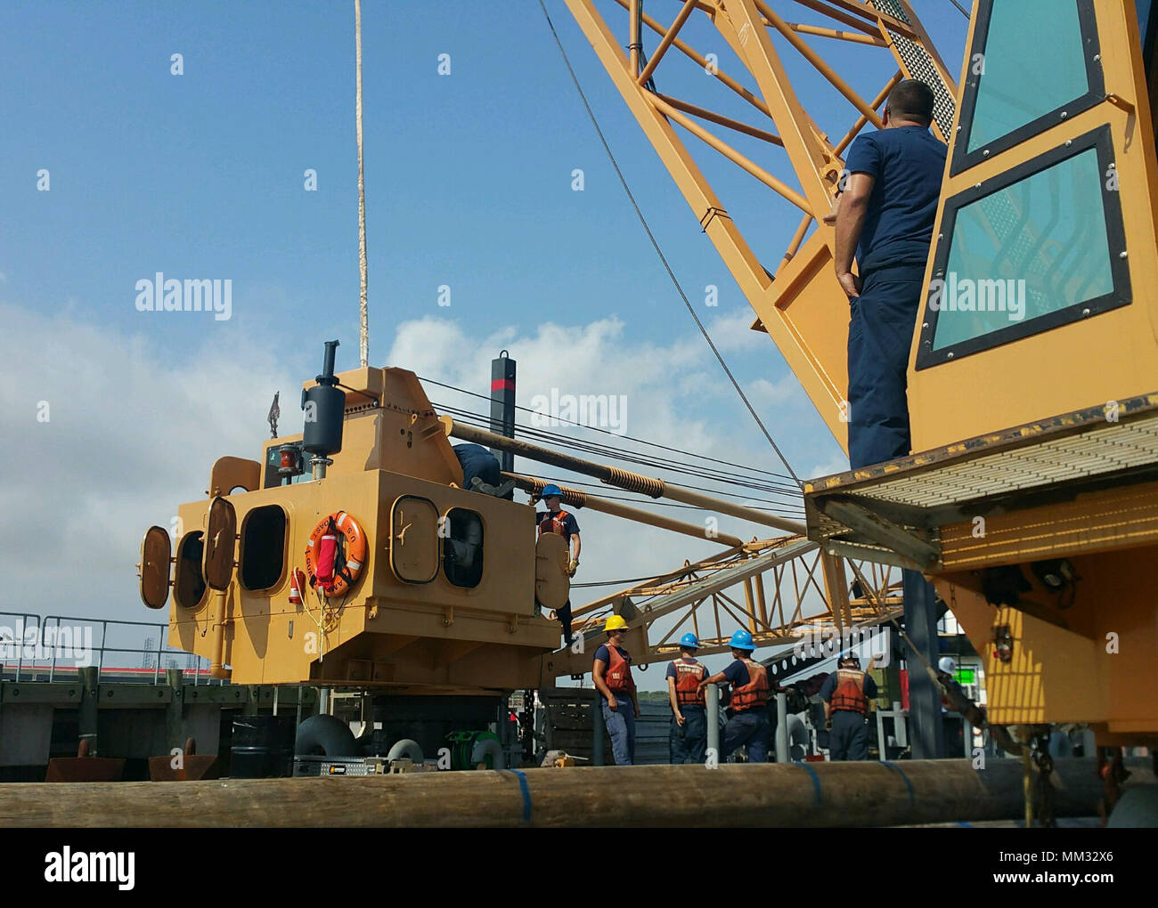 Crew members aboard Coast Guard Cutters Hatchet and Clamp, 75foot