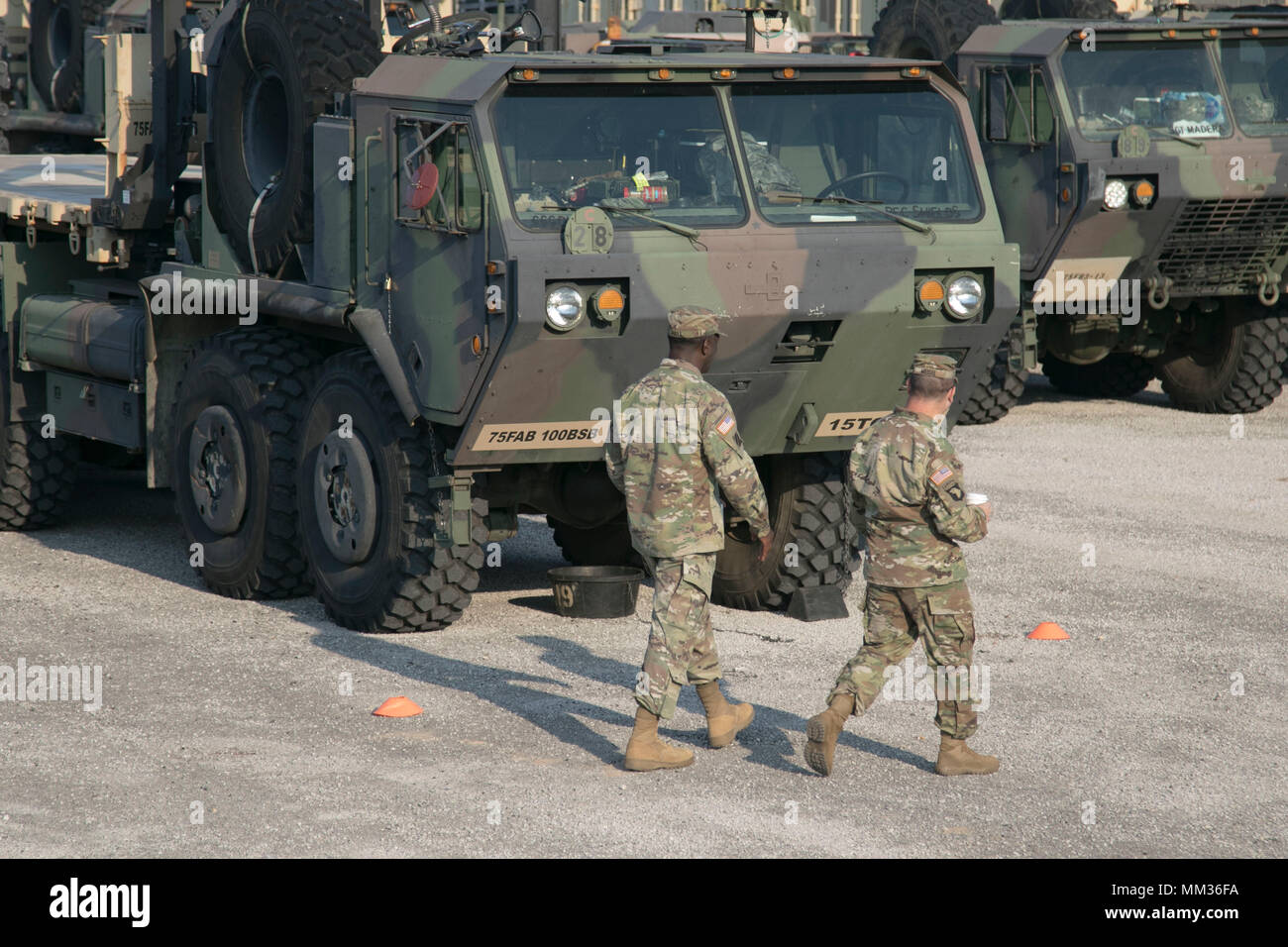 Lt. Col. Christian B. Meisel, logistics officer and Master Sgt. Charles ...