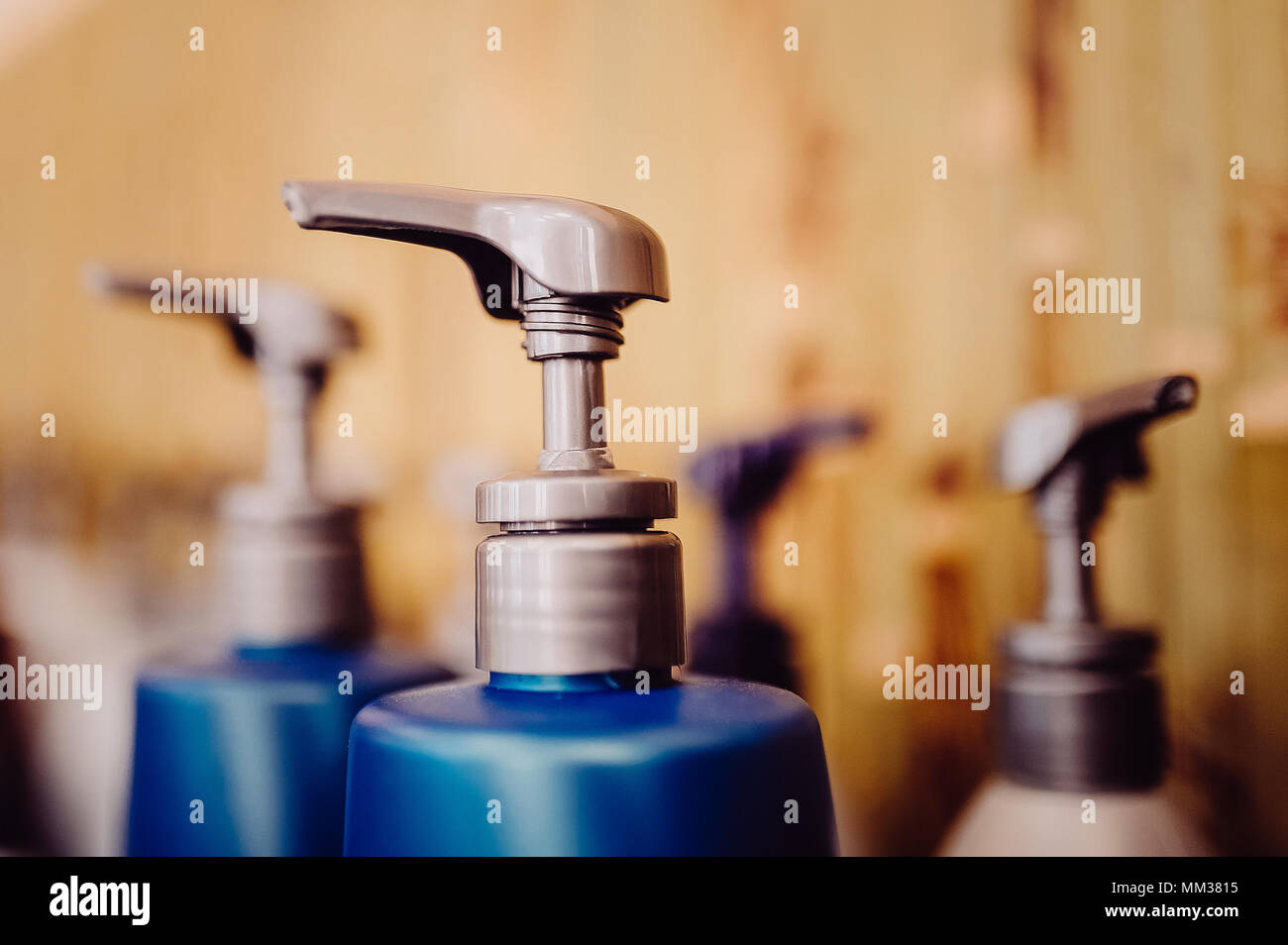 Bottle of liquid soap, shower gel or shampoo. Toned image. Shampoo bottle with dispenser Stock Photo