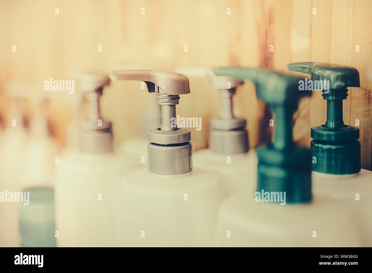 Bottle of liquid soap, shower gel or shampoo. Toned image. Shampoo bottle with dispenser. close up view Stock Photo