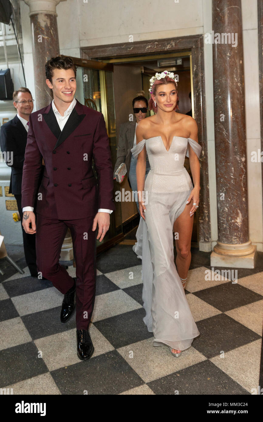 New York, United States. 07th May, 2018. Shawn Mendes, Hailey Baldwin  wearing design by Tommy Hilfiger leaving The Pierre Hotel for Heavenly  Bodies: Fashion & The Catholic Imagination Costume Institute Gala at