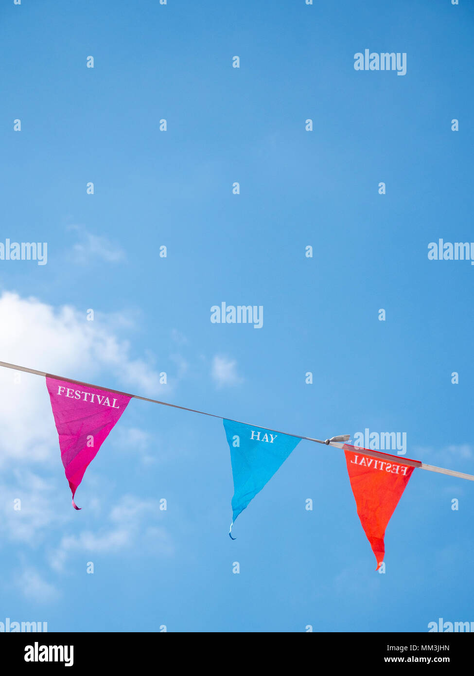 Colourful bunting in Hay-on-Wye advertise the Hay Festival for 2018 Stock Photo