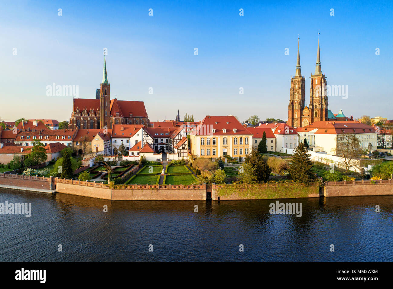 Poland. Wroclaw. Ostrow Tumski, Gothic cathedral of St. John the Baptist,  Collegiate Church of the Holy Cross and St. Bartholomew and Odra (Oder) Riv Stock Photo