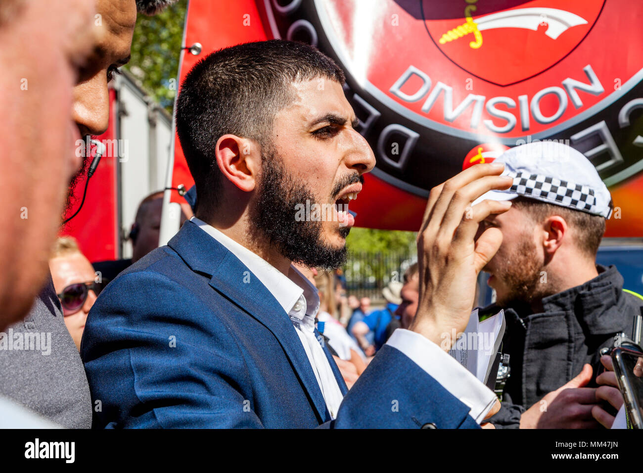 Ali Dawah a prominent Muslim speaker argues for the right to read a speech at the day for freedom rally. London, UK Stock Photo