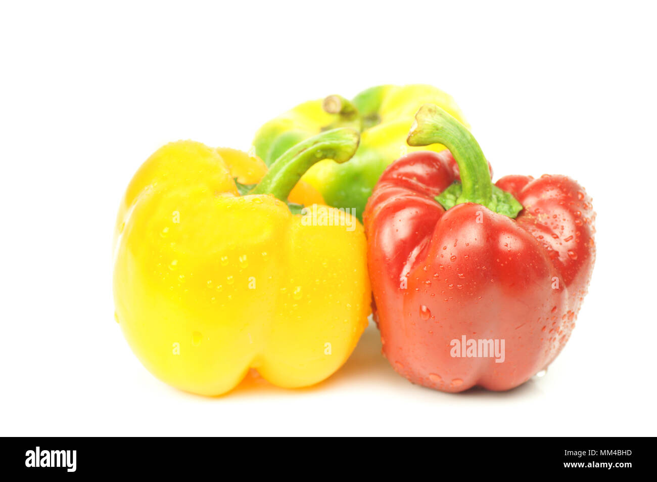 red and yellow sweet pepper isolated on white background Stock Photo ...
