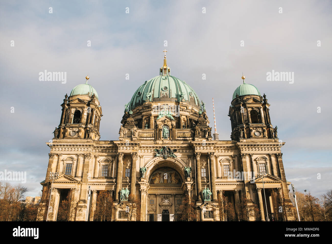 Beautiful old building in the style of neoclassicism and baroque with cross and sculptures Stock Photo