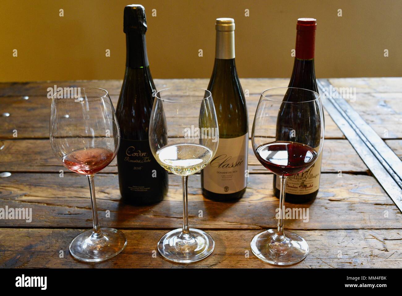 Fine wines on display at tasting, white, rose and red wine with bottles